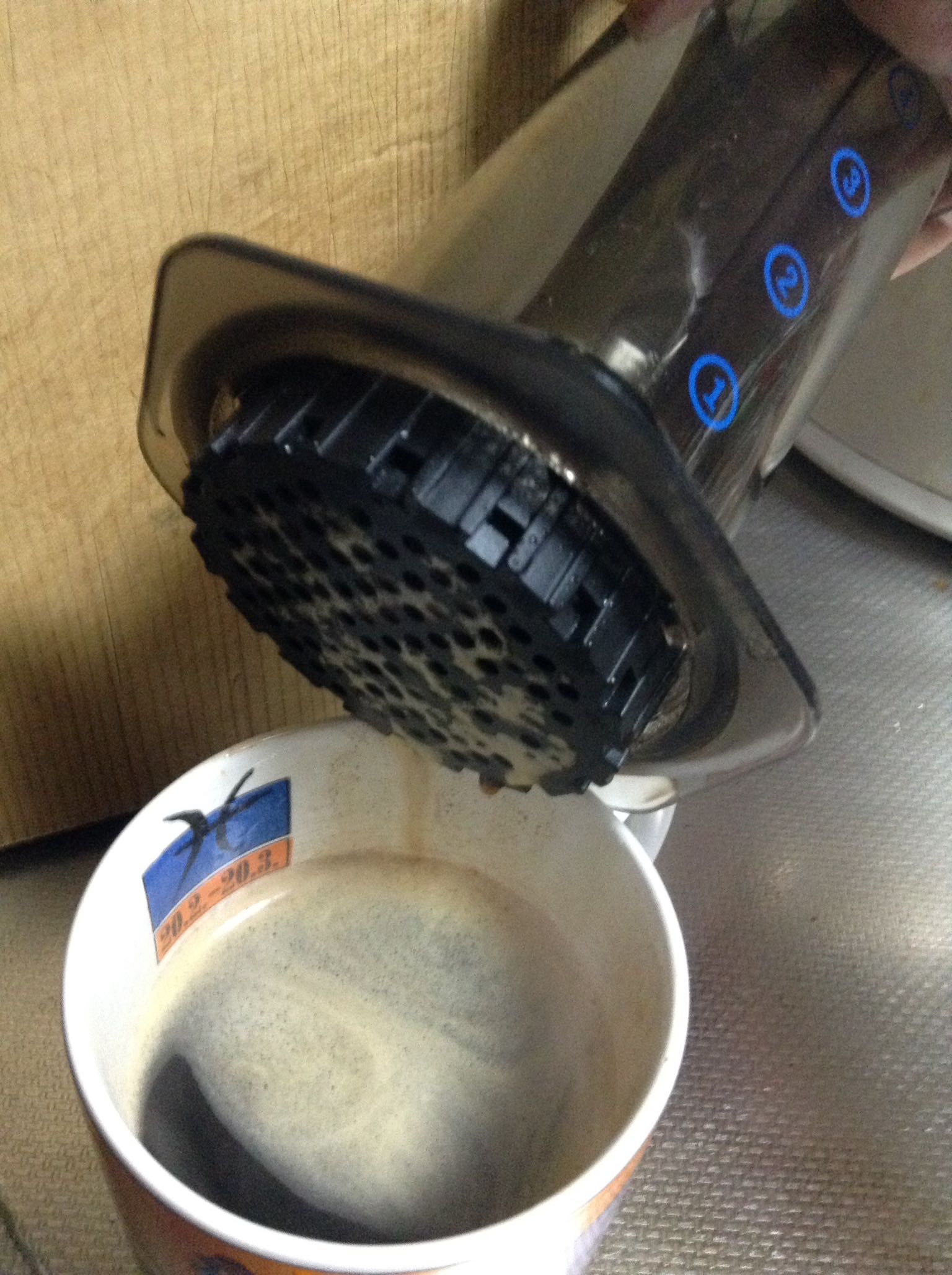 AeroPress Original coffee maker resting on a mug